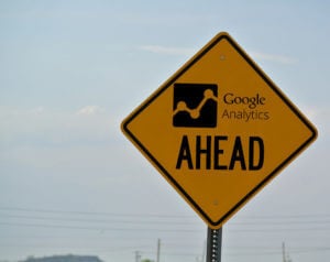 Photo of orange "construction style" road sign reading "Google Analytics Ahead"