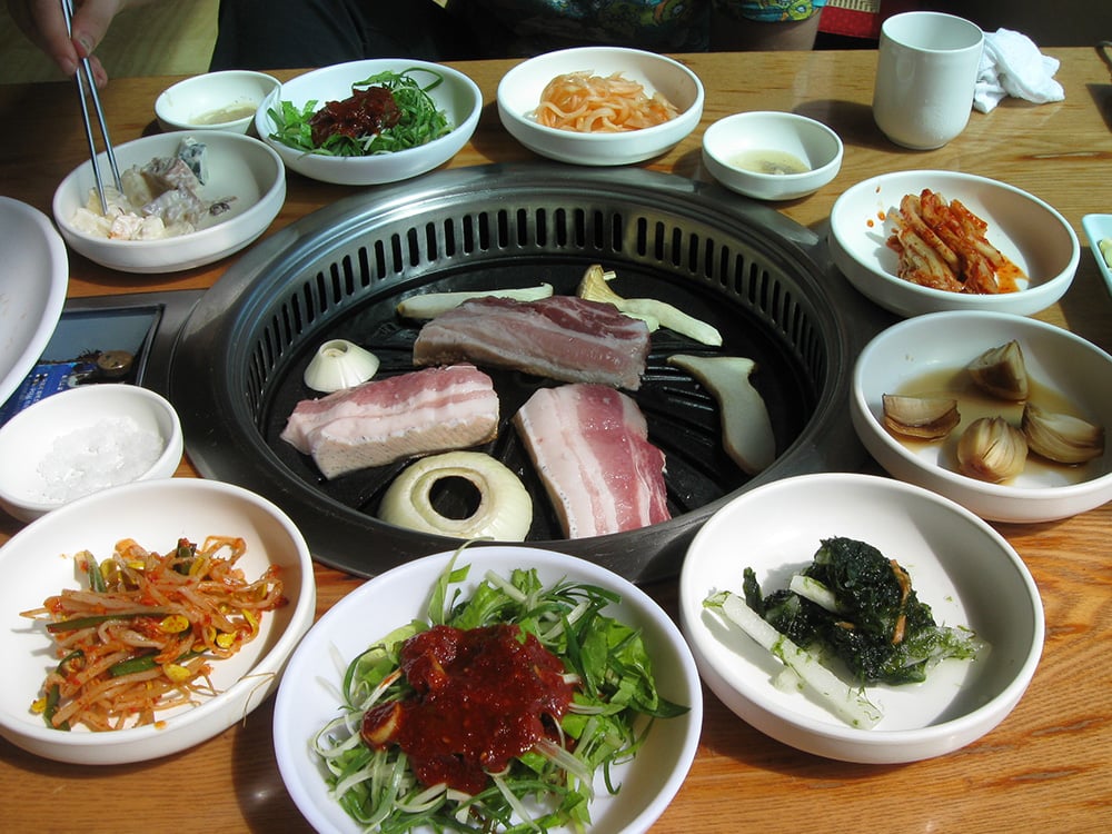 korean bbq with side dishes