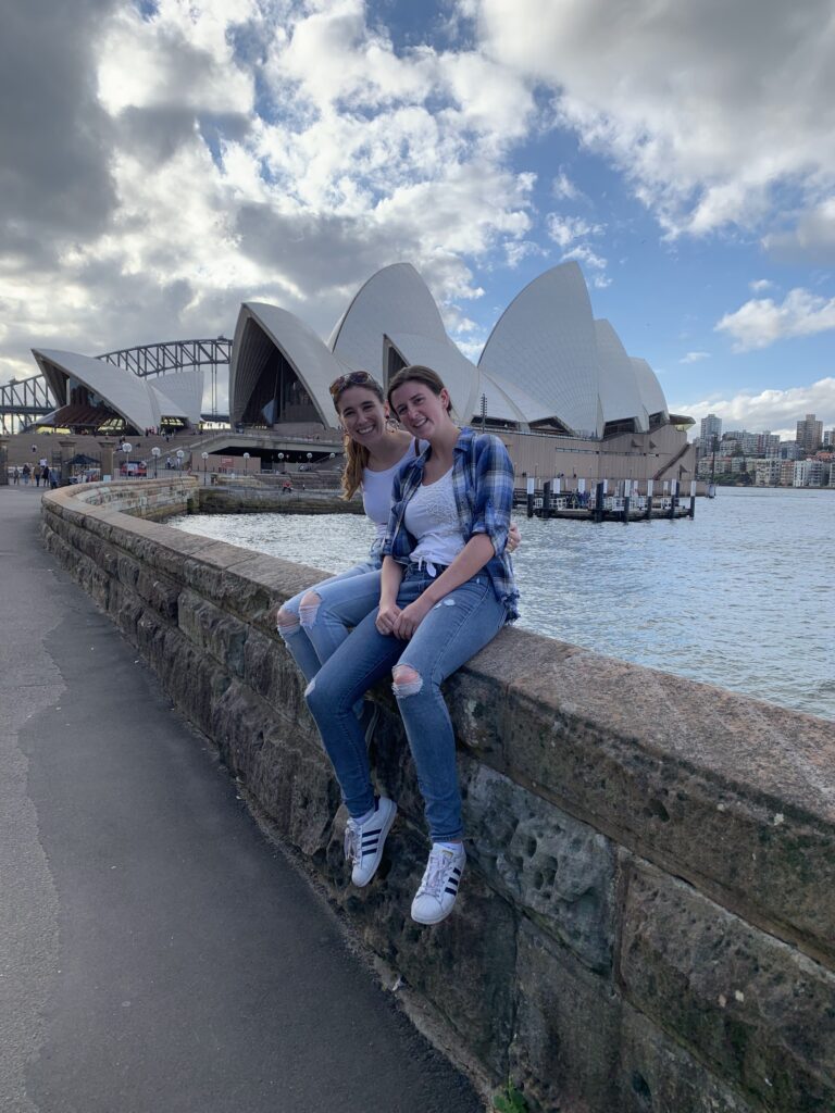 Abby in front of the Sydney Opera house in Australia