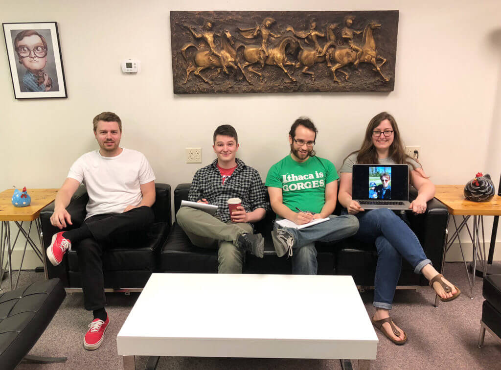 Bytes support team members sitting on a couch