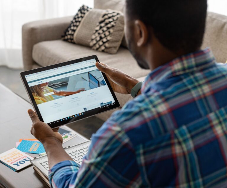 Man looking LinkedIn Sales Navigator on an iPad