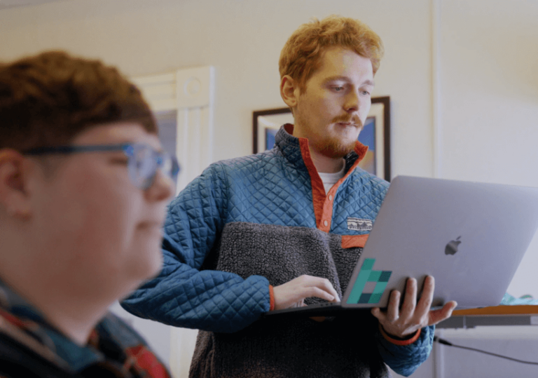 Two digital marketing specialists working together on a project in the Bytes.co office