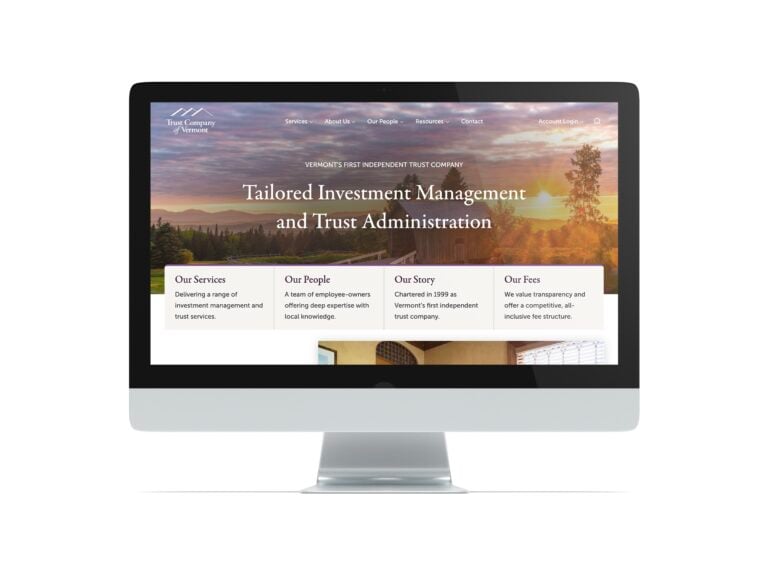 The new Trust Company of Vermont website homepage on a desktop computer