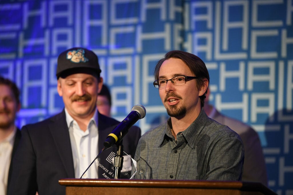 Jay Di Vece delivers remarks to the crowd after accepting the award for Business of the Year.