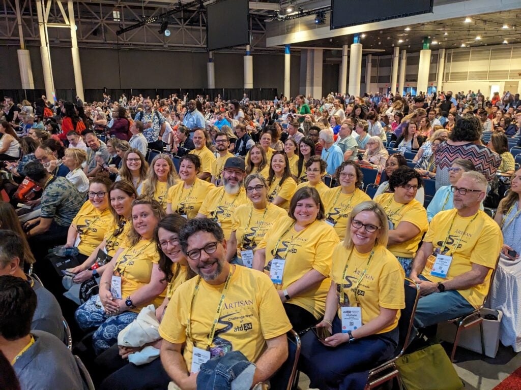 The Artisan Learning team sitting together at an event