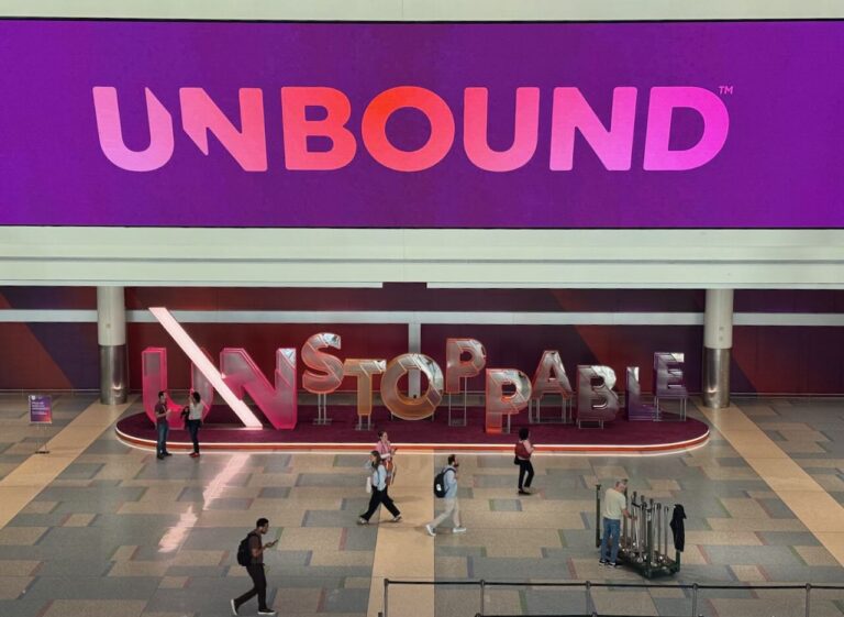 Unbound banner with a sculpture reading Unstoppable underneath it